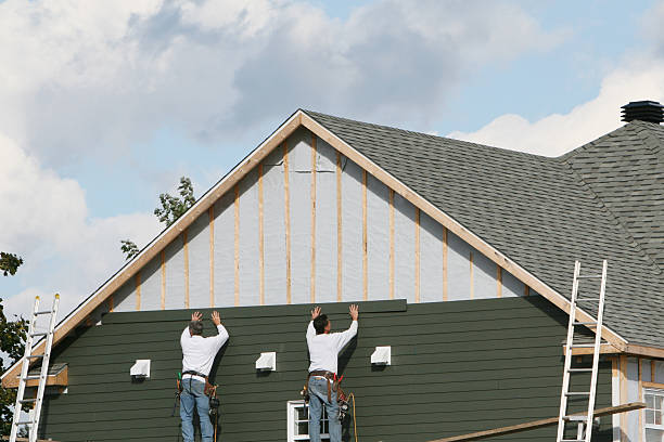 Professional Siding technician working in Denver, NC